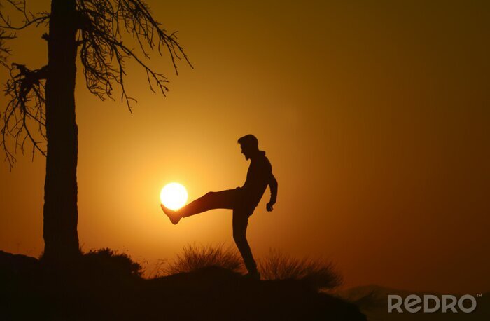 Tableau  Ballon de football et coucher du soleil