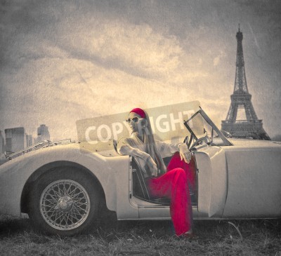Tableau  Beautiful fashion woman on a car in Paris