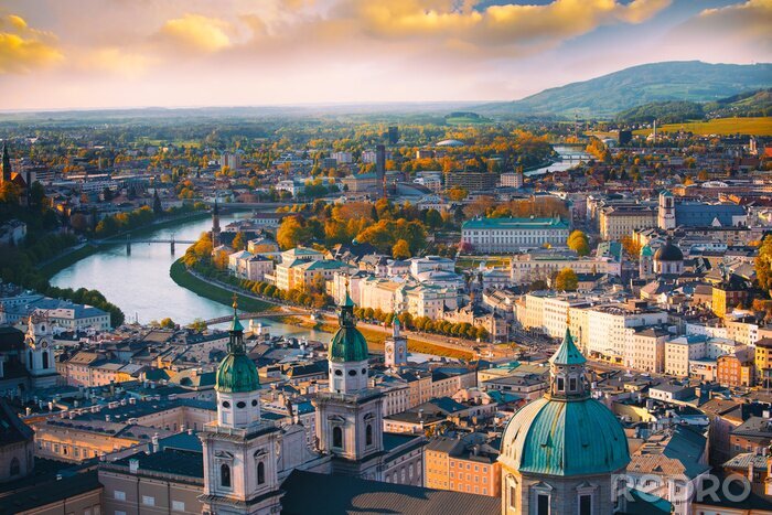 Tableau  Beautiful of Aerial panoramic view in a Autumn season at a historic city of Salzburg with Salzach river in beautiful golden evening light sky and colorful of autumn at sunset, Salzburger Land, Austria
