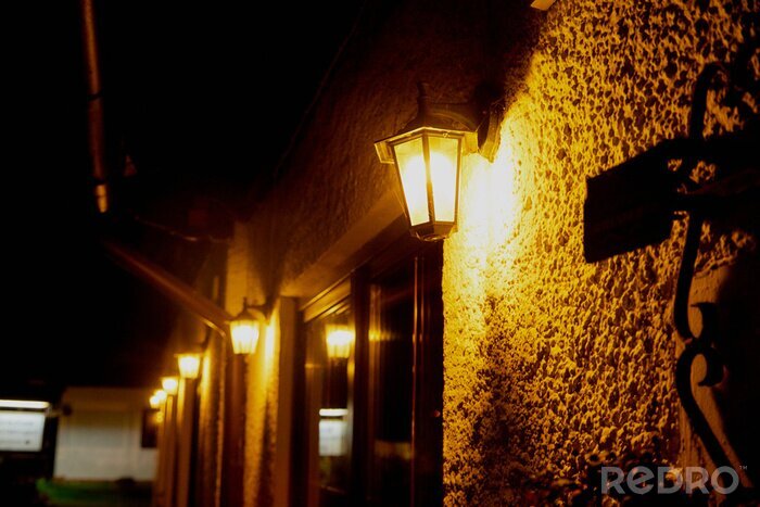 Tableau  Beautiful street lanterns illuminated at evening or night