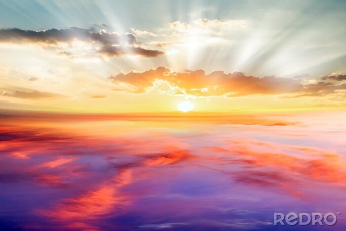 Tableau   Beautiful sunrise .   Beautiful heavenly landscape with the sun in the clouds  .
