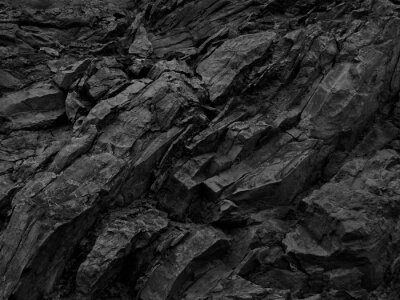 Tableau  Black rock background. Dark gray stone texture. Black grunge background. Mountain close-up. Distressed backdrop.