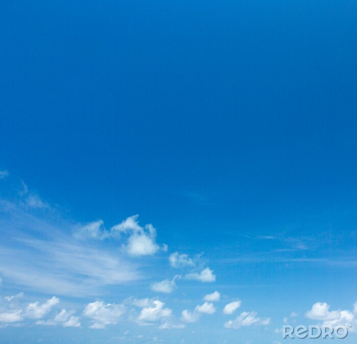 Tableau  Blue sky background with tiny clouds. clouds in the blue sky