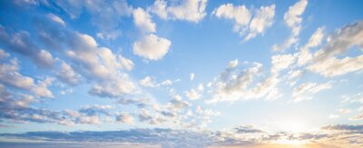 Tableau  Blue sky clouds background. Beautiful landscape with clouds and orange sun on sky