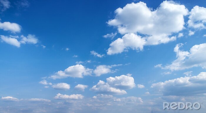 Tableau  Blue sky with white clouds. Blue sky background with clouds.