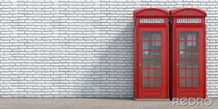 Tableau  Cabine téléphonique rouge sur fond de mur de brique. Londres, symbole britannique et anglais.