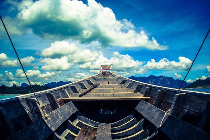 Tableau  ciel bleu et un bateau