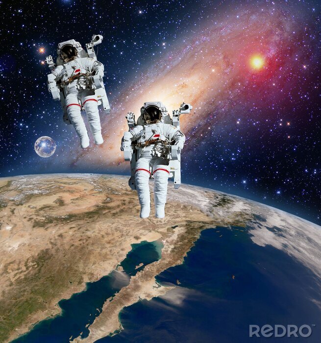 Tableau  Ciel étoilé de galaxie et deux astronautes