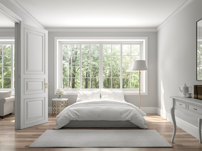 Tableau  Classical bedroom and living room 3d render,The rooms have wooden floors and gray walls ,decorate with white and gold furniture,There are large window looking out to the nature view.