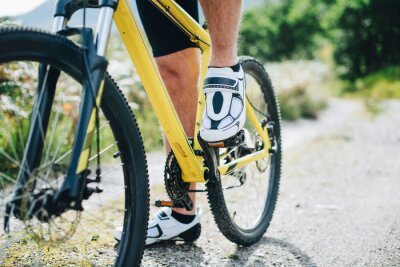 Tableau  Closeup of a man wearing cycling shoes