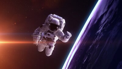 Tableau  Cosmonaute sur le fond de la planète Terre