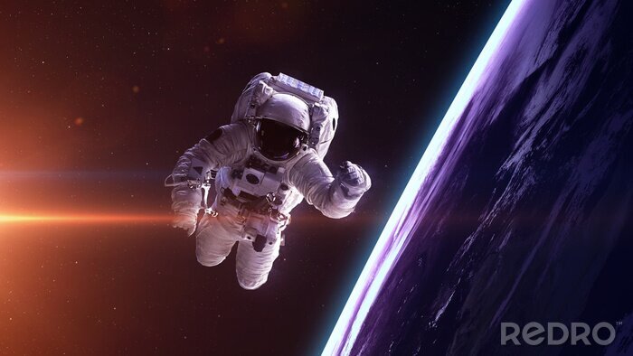 Tableau  Cosmonaute sur le fond de la planète Terre