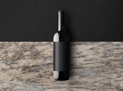 Tableau  Dark wine bottle on a black and wooden background with copy space. Wine bottle mockup. Top view. 3d illustration.