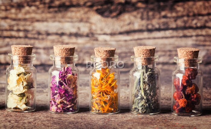 Tableau  Des pots d'herbes séchées et de fleurs sur bois