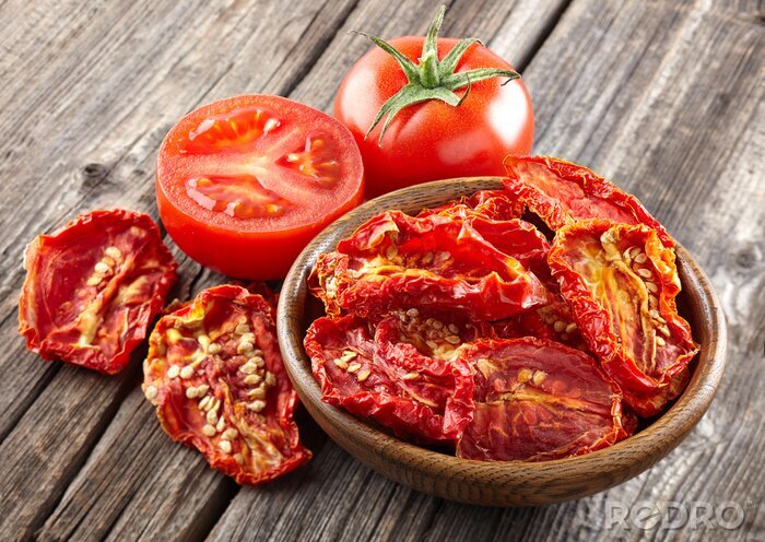 Tableau  Dried tomato on a wooden background
