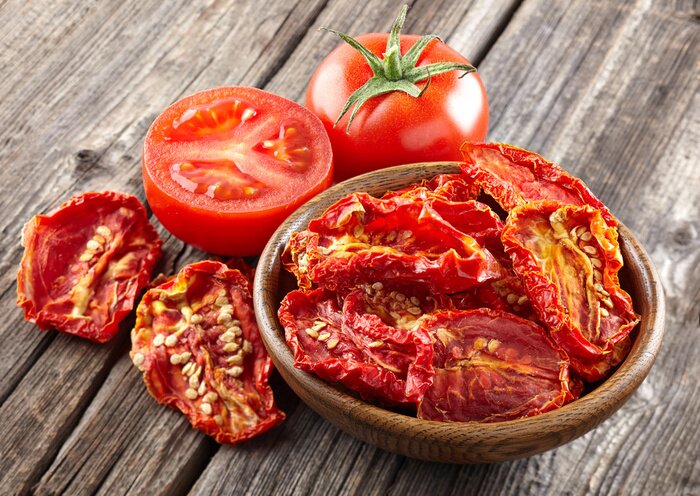 Tableau  Dried tomato on a wooden background