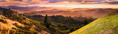 Tableau  Expansive panorama in Santa Cruz mountains, with hills and valleys illuminated by the sunset light; San Francisco Bay Area, California
