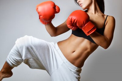 Tableau  Femme qui s'entraîne avec des gants de boxe