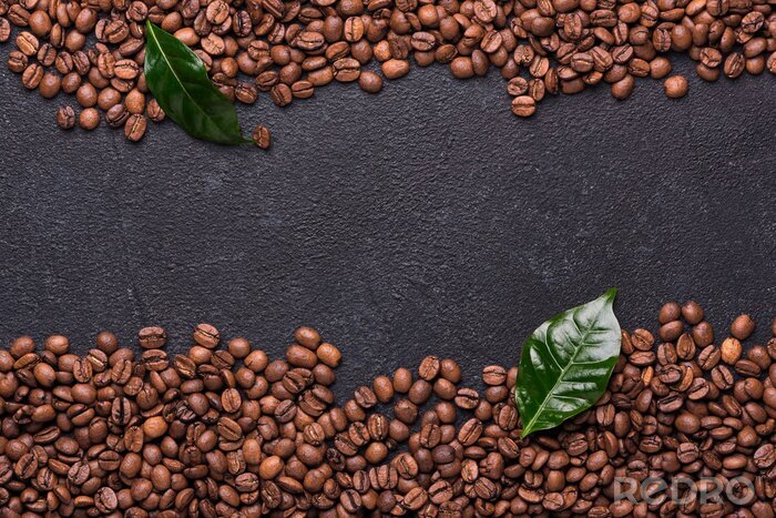 Tableau  Grains de café avec des feuilles de café sur fond noir