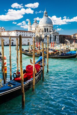 Grand Canal in Venice, Italy, with colorful gondola boats