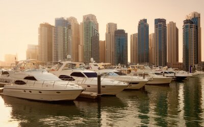 Tableau  Gratte-ciel et yachts dans la marina de Dubaï Pendant Sunset