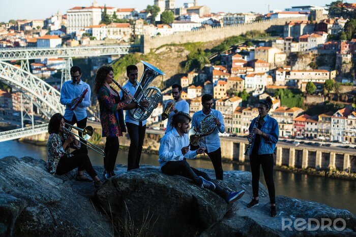 Tableau  Group of musicians, Jazz band, play music in the old Porto, Portugal.