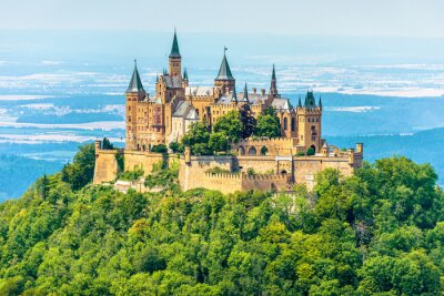 Tableau  Hohenzollern Castle on mountain top, Germany. This castle is a famous landmark in vicinity of Stuttgart. Scenic view of Burg Hohenzollern in summer. Landscape of Swabian Alps with Gothic castle.