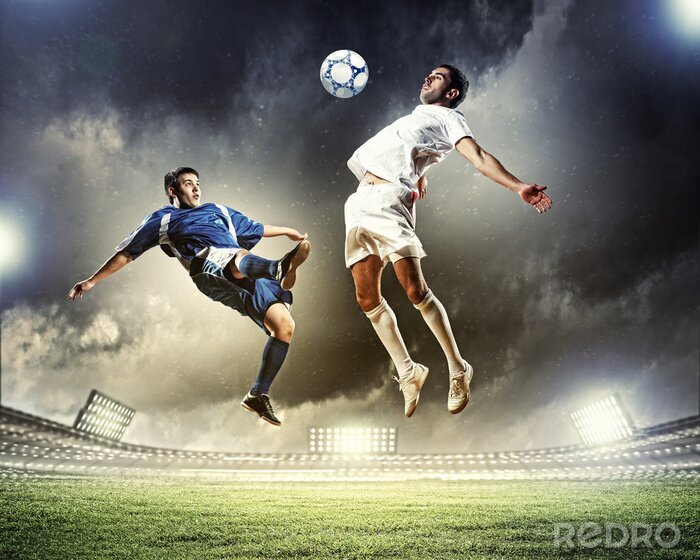 Tableau  Joueurs de football avec un ciel orageux en arrière-plan