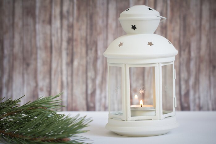 Tableau  lanterne avec bougie sur fond de bois