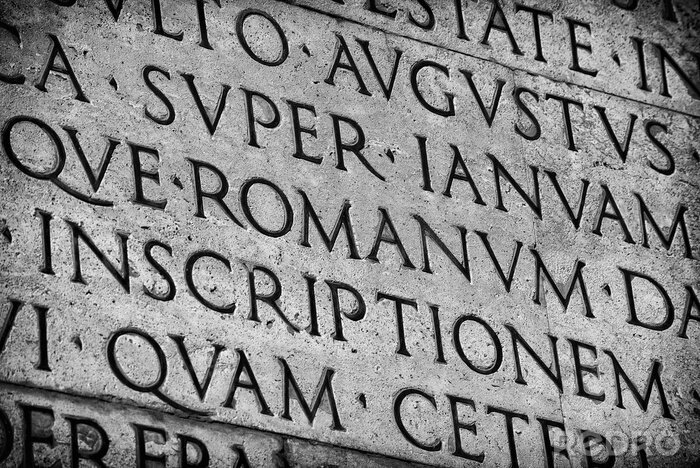 Tableau  Latin ancient language and classical education. Inscription from Emperor Augustus famous Res Gestae (1st century AD), with the word Romanum in the center (Black and White)