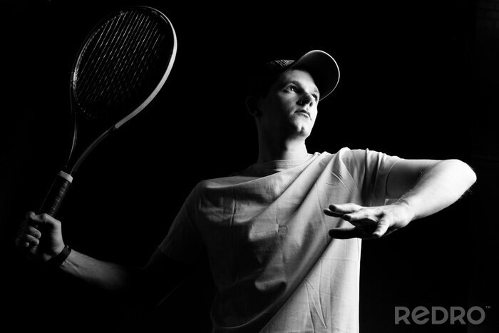 Tableau  Le joueur de tennis sur fond noir. Studio, coup