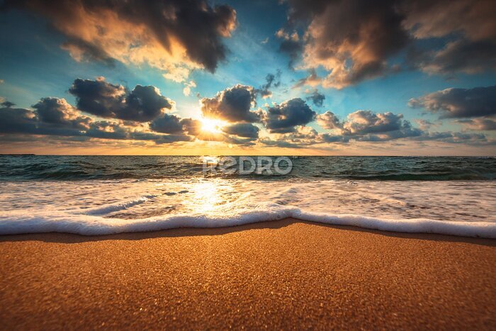 Tableau  Le lever du soleil sur une mer calme