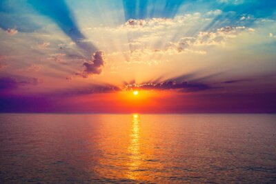 Tableau  lever de soleil dans la mer