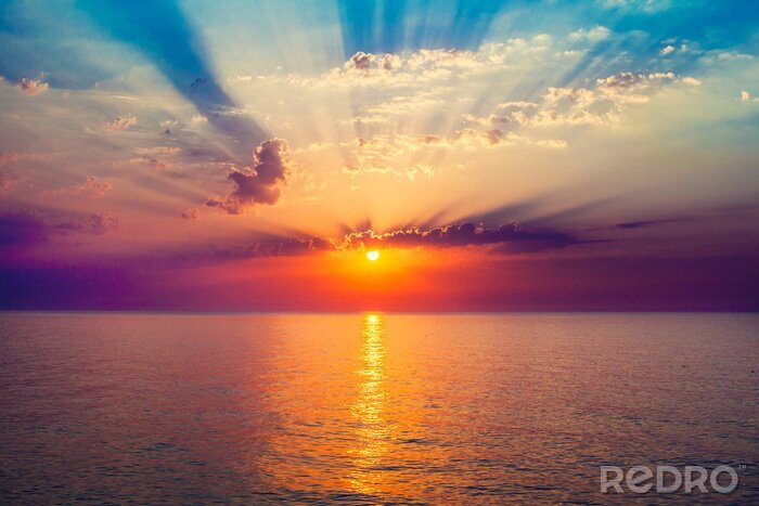 Tableau  lever de soleil dans la mer