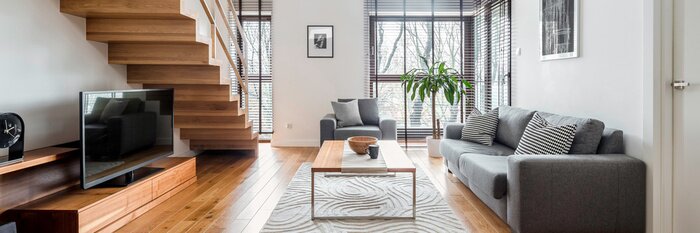 Tableau  Living room with wooden stairs, panorama
