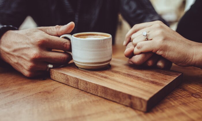 Tableau  Loving couple sitting together at coffee shop