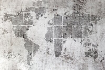 Tableau  Muro grigio con collage di fogli di giornali une forma del mondo