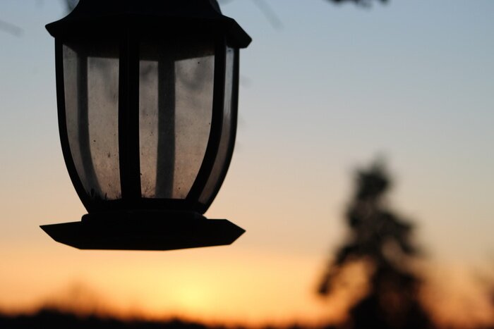 Tableau  old lantern in the sunset