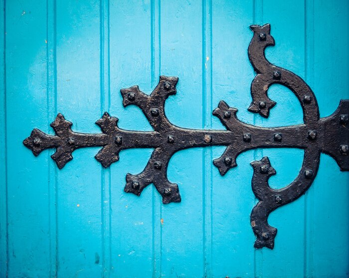 Tableau  Ornate Hinge On Blue Church Door