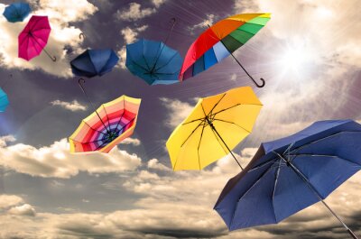 Tableau  Parapluies colorés contre le ciel