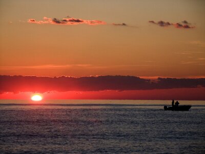 Tableau  Pêcheurs sur fond de coucher de soleil