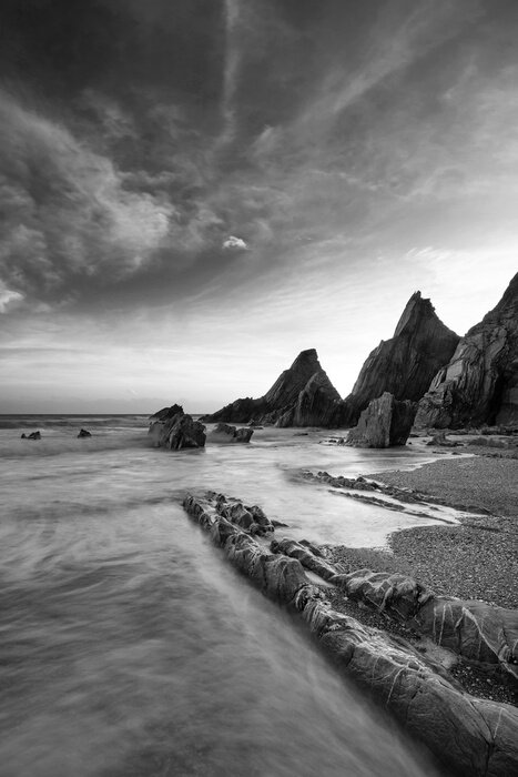 Tableau  Plage de sable avec des rochers