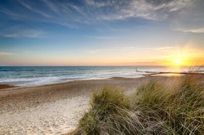 Plage dunes au coucher du soleil