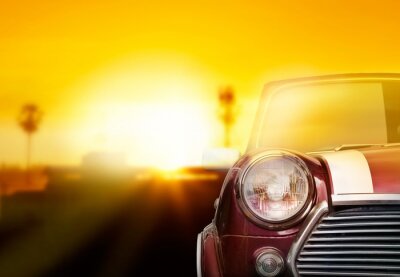Tableau  Rétro tête de voiture lumière sur rue dans le coucher de soleil fond