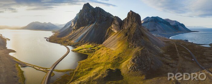 Tableau  scenic road in Iceland, beautiful nature landscape aerial panorama, mountains and coast at sunset