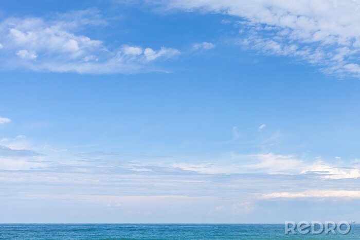 Tableau  Sea water under cloudy blue sky