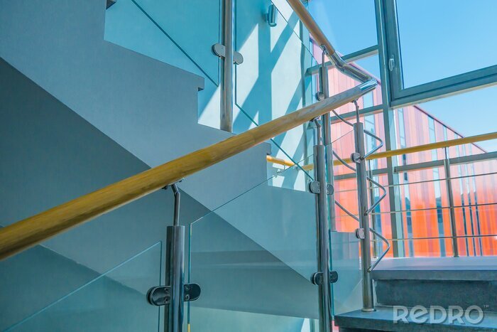 Tableau  Stainless steel, glass and wood railing.Fall Protection. modern design of handrail and staircase