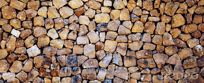 Tableau  Stones, rocks and boulders - as a stone wall background texture / abstract design.