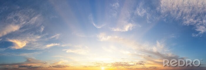 Tableau  Sunset cloudy sky with the orange sun