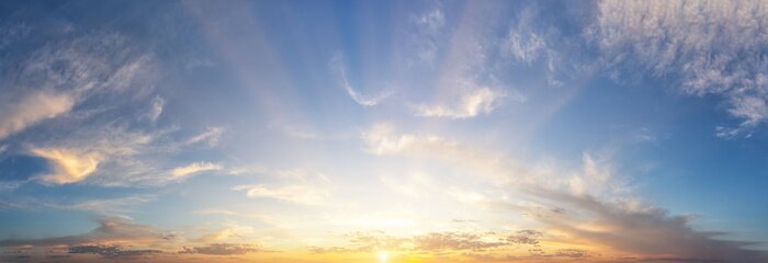 Tableau  Sunset cloudy sky with the orange sun